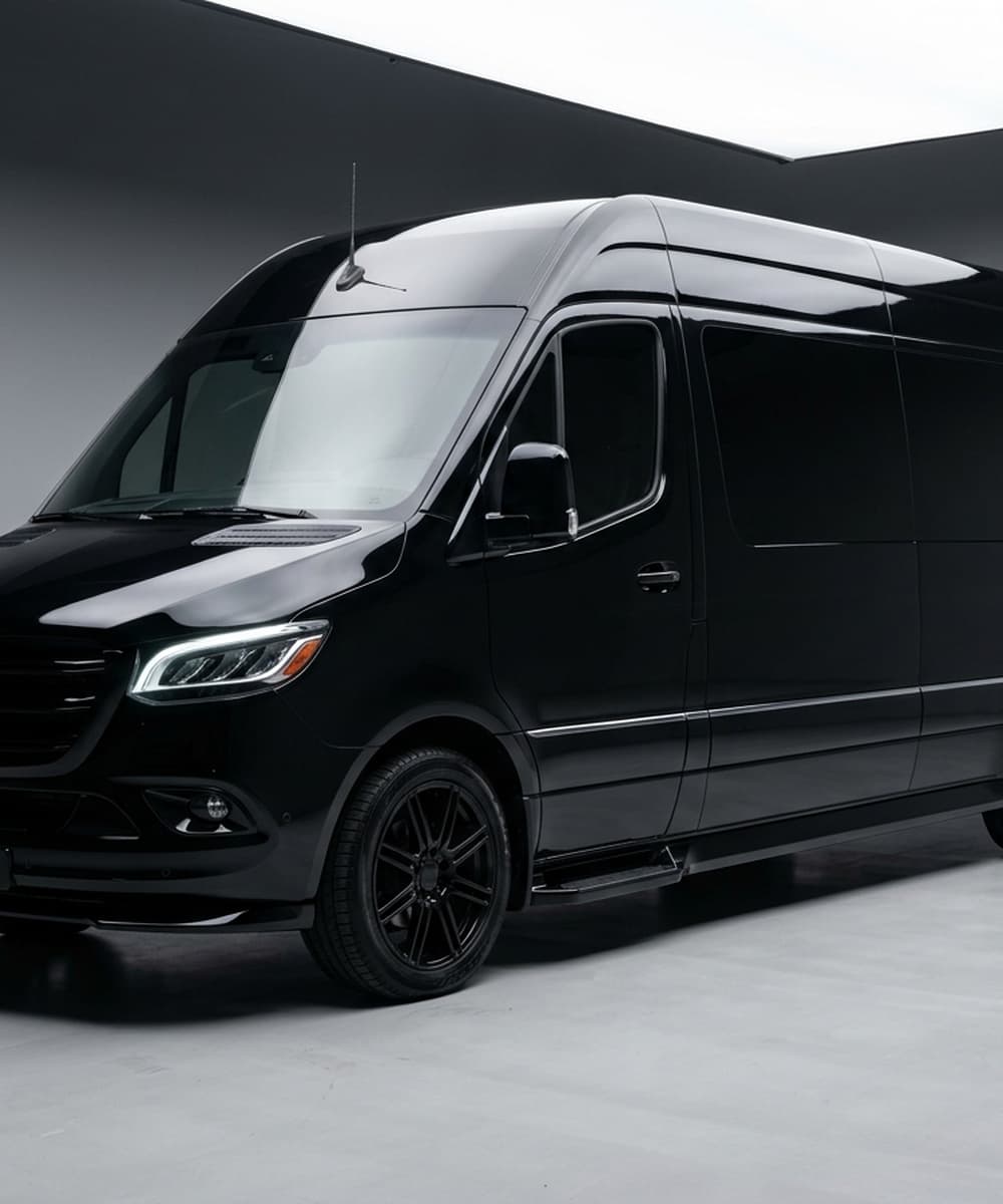 Corporate professionals traveling in a Boston Sprinters executive van